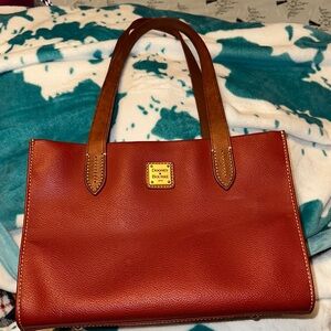 Dooney & Bourke Deep Red and brown  Leather Tote leather is perfect 👌 medium 💼.